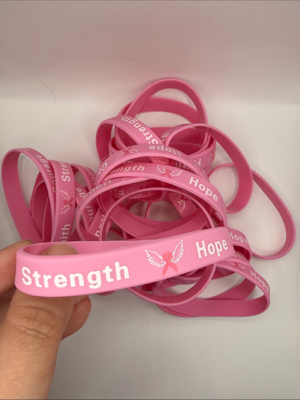 Lot of 27 Pink Breast Cancer Awareness Silicone Wristbands